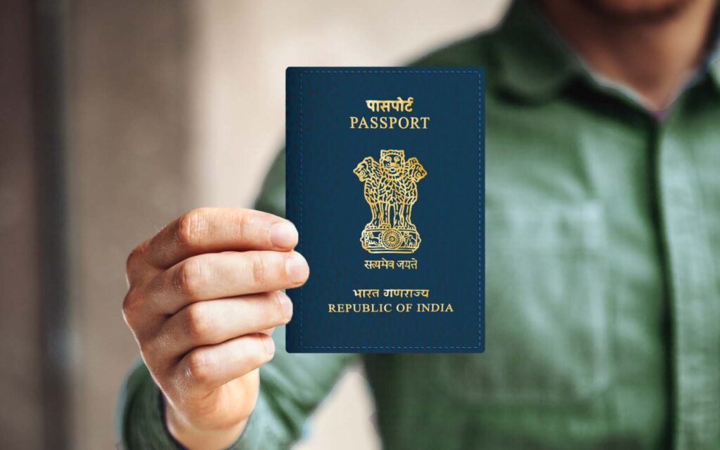 Indian passport held in hand, representing the police verification process required for passport issuance in India.
