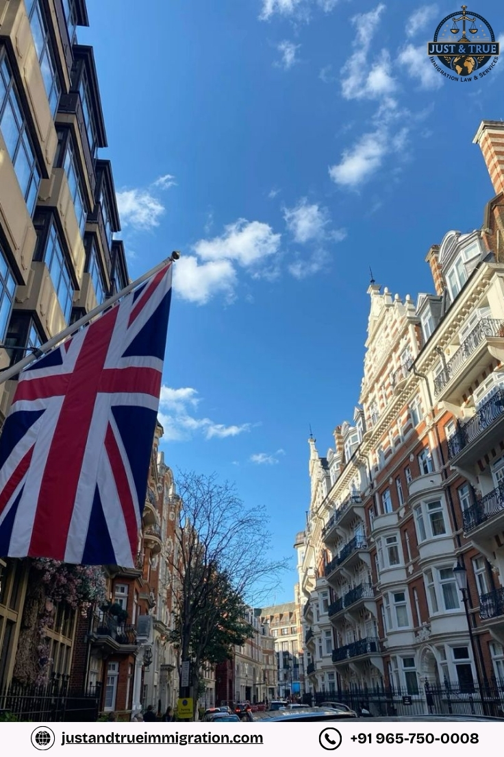 United Kingdom city street with the British flag, representing immigration to the UK and guidance on visas, work, study, and settlement.